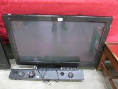 A Panasonic TV and Bush sound bar