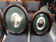 A pair of oval portraits