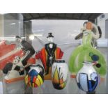 A collection of Art Deco style figures and vases including Lorna Bailey