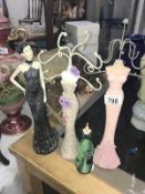 A quantity of jewellery trees in shape of women figures etc