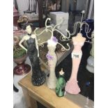 A quantity of jewellery trees in shape of women figures etc