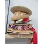 A quantity of straw hats etc.