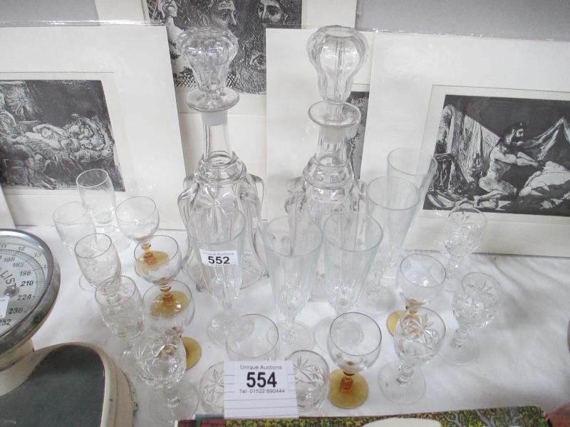 Two decanters and a quantity of glasses