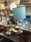 A selection of brass lamps