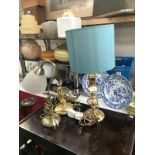 A selection of brass lamps