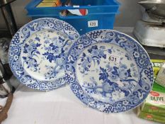 Two old blue and white floral design plates