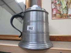 A large metal stein