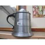 A large metal stein