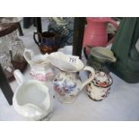 A quantity of old jugs including lustreware