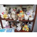 Two shelves of soft toys