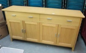 A Morris of Glasgow oak sideboard