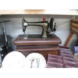 A Bradbury medium sewing machine in case