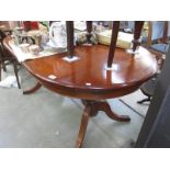 A mahogany dining table