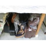 A quantity oif handbags and satchels