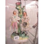 A Staffordshire figure of a Man and Woman