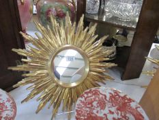 A pair of Sunburst wall mirrors