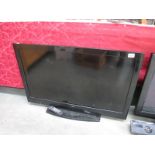 A LUXOR TV with remote