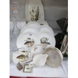 A collection of Fieldings Crown Devon fish plates etc