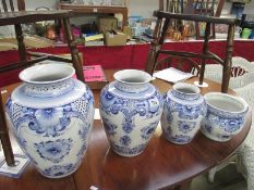 4 graduated blue and white vases 1 a/gf