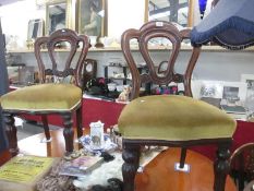 A matching pair of Victorian chairs