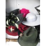 A collection of vintage and other hats
