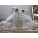 A pair of 19th/20th century Staffordshire Pottery dogs