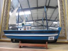 A model of a boat on stand