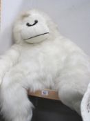 A large white monkey toy