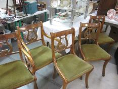 A set of 5 lyre back chairs