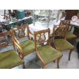 A set of 5 lyre back chairs