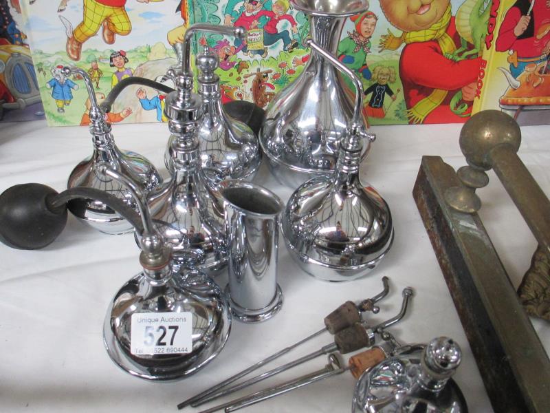 An interesting collection of polished silver jars and vessels