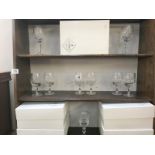 A quantity of Cumbria crystal wine glasses with boxes.