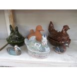 2 chicken and 2 duck egg crocks and 2 duck figures/ornaments