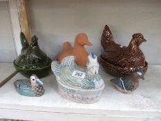 2 chicken and 2 duck egg crocks and 2 duck figures/ornaments