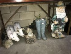 A quantity of concrete fibre glass garden ornaments including garden gnome & pigs etc.