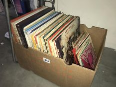 A box of LP and45 rpm records.