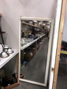 A Victorian bevel edged over mantel mirror.