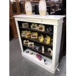 A white painted bookcase