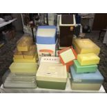 A quantity of vintage plastic Tupperware style storage boxes and bread bins.