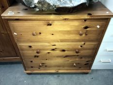 A solid pine chest of drawers