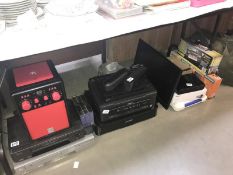A large lot including 2 printers, 2 VHS recorders, bluetooth speaker, monitor, laminator,