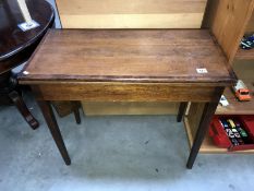 An Edwardian card table