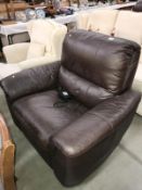 A brown leather recliner armchair