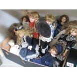 A box of collectors dolls etc.