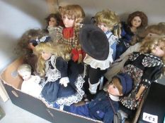 A box of collectors dolls etc.