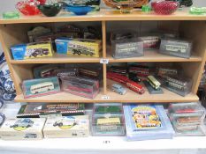 A collection of Corgi model buses and trolleybus along with other models inc.