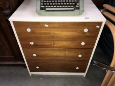 A teak fronted retro chest of drawers