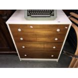 A teak fronted retro chest of drawers