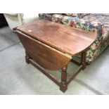 An oak gateleg table