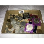 A tray of mixed UK coins including crowns.